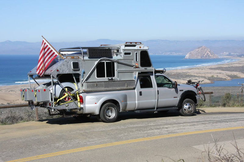 Illustration for article titled For $30,000, Could This 2006 Ford F-350 Car Carrier/Camper Be All The Prep You Need?